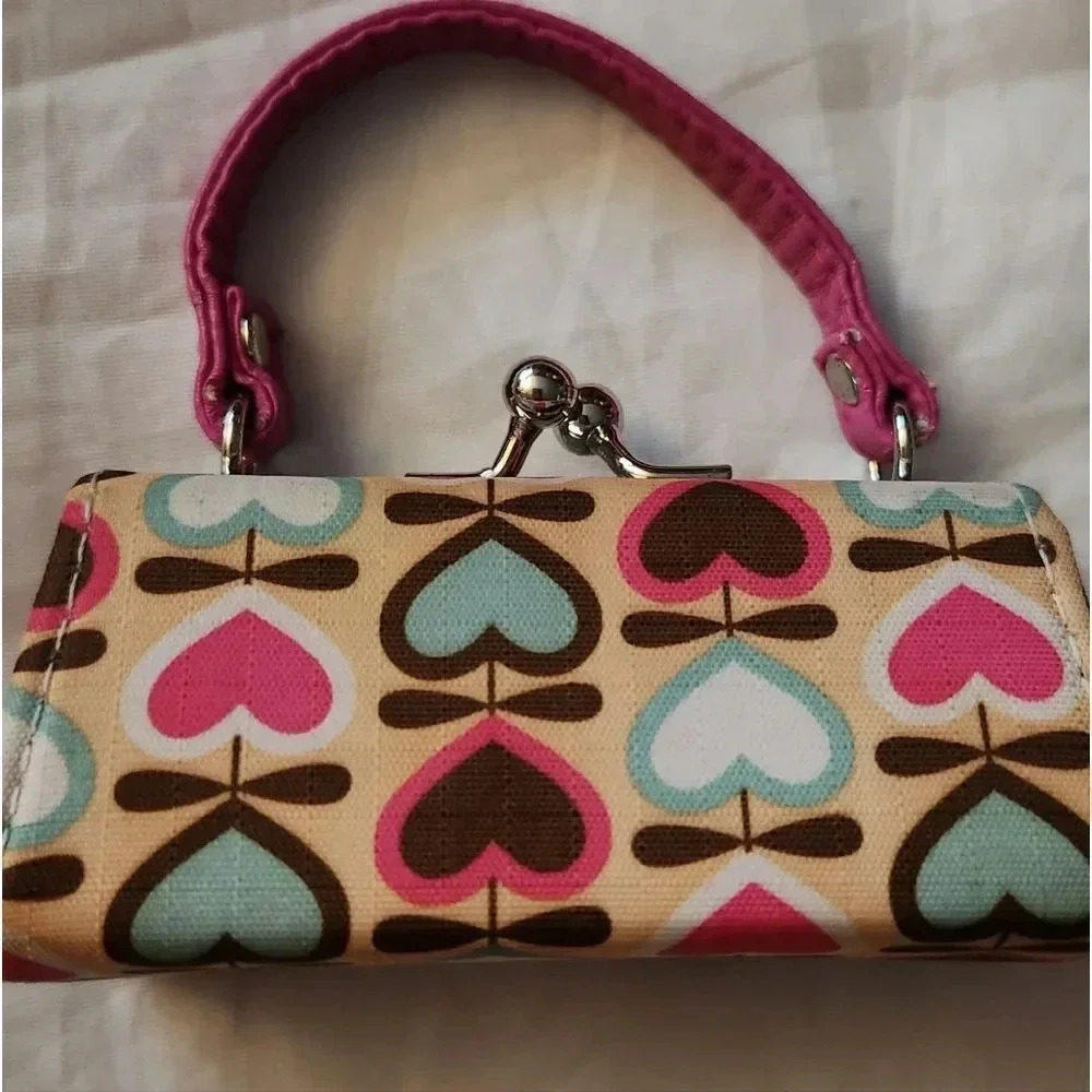 ‎Lipstick/coin holder
